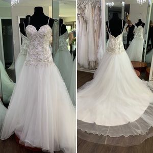 Ivory Drop Waist Mermaid Bridal Gown. Silver Beading Details and Embroidery.